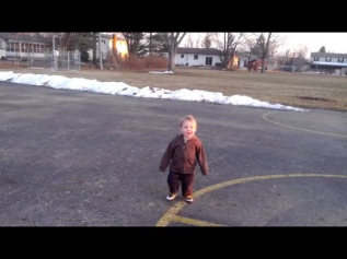 Elias running around the playground